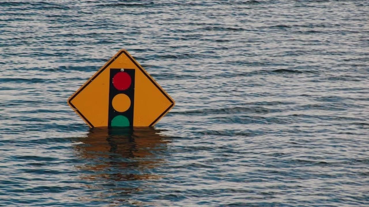 stop sign under water