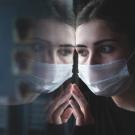 woman reflection with mask