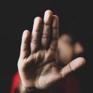 hand raised to say stop